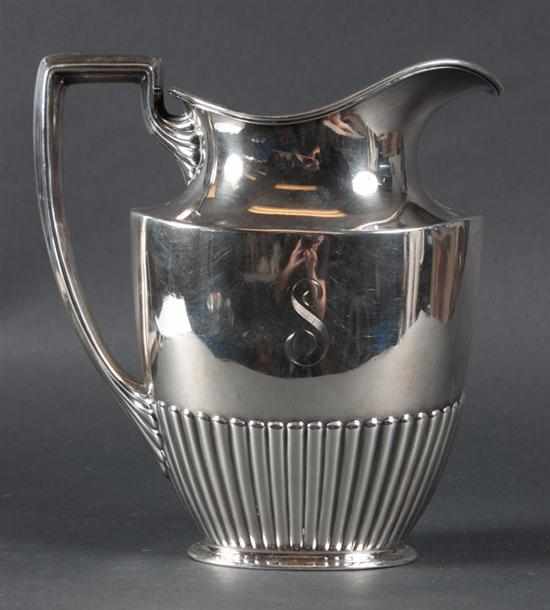 Appraisal: American Georgian style sterling silver half-reeded water pitcher Gorham dated