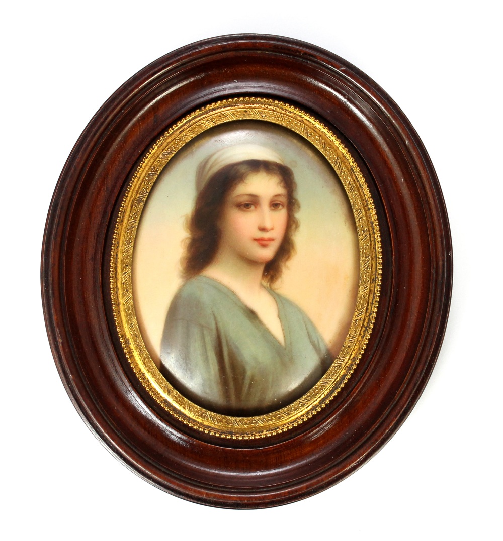 Appraisal: A German oval porcelain plaque late th century painted with