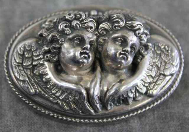 Appraisal: Sterling Henryk Winograd Signed Brooch Depicting putti Signed ''HW ''