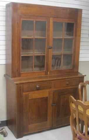 Appraisal: MAHOGANY KITCHEN CABINET-ON-CUPBOARD American th century the top section a