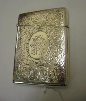 Appraisal: AN EDWARDIAN CARD CASE of oblong form with monogrammed cartouche