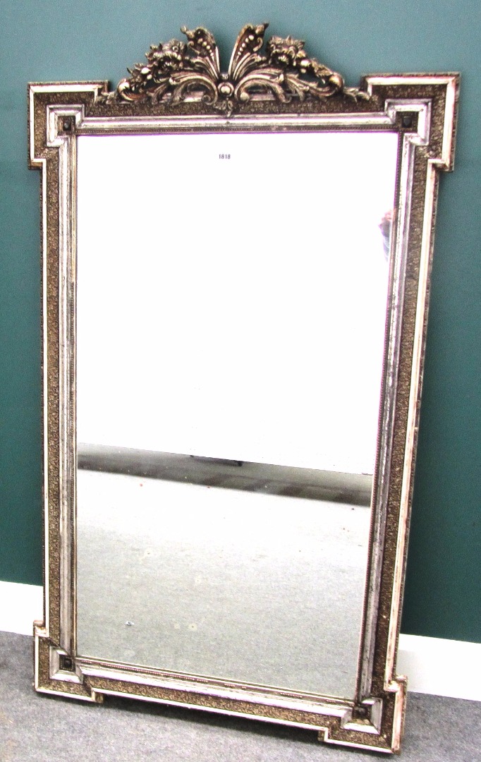 Appraisal: A th century silver painted mirror with outstepped square corners