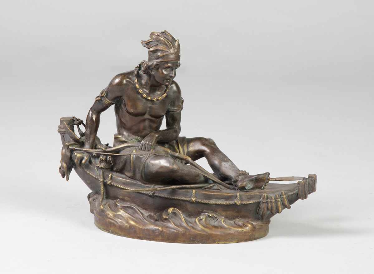 Appraisal: Sgn Ducholselle Patinated Bronze Indian in Canoe Original patina Ht