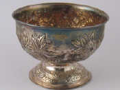 Appraisal: A small rosebowl on spread foot embossed with flowers Mappin