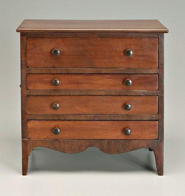 Appraisal: Federal miniature chest walnut with poplar secondary four graduated dovetailed