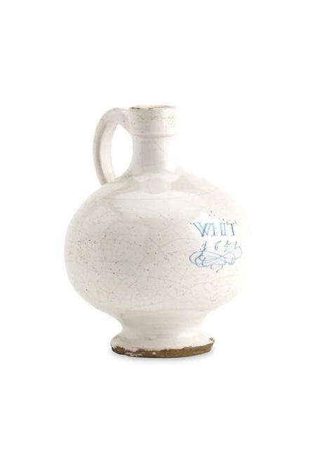 Appraisal: A th century London Delft wine bottle dated of squat