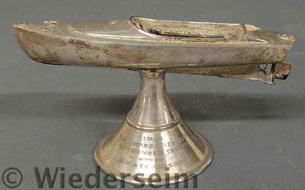 Appraisal: Silverplate boating trophy of a runabout inscribed Delaware River Club