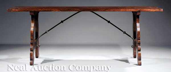 Appraisal: A Renaissance-Style Walnut Trestle Table plank top splayed scrolled supports