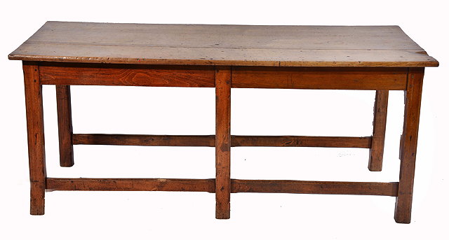 Appraisal: A CONTINENTAL BEECH KITCHEN TABLE with three plank top standing