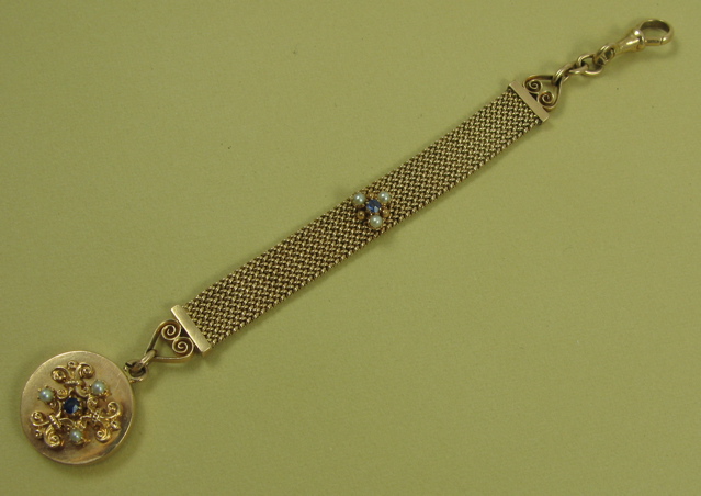 Appraisal: FOURTEEN KARAT GOLD WATCH FOB AND CHAIN American c the