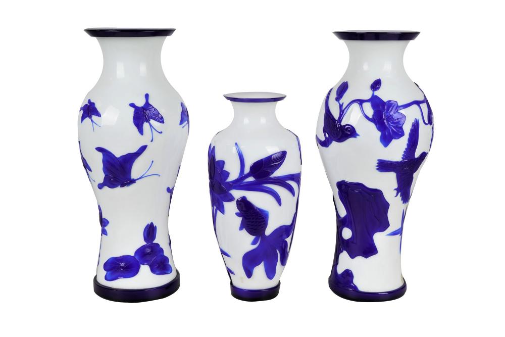 Appraisal: SET OF THREE CHINESE BLUE WHITE PEKING GLASS VASESProvenance Estate