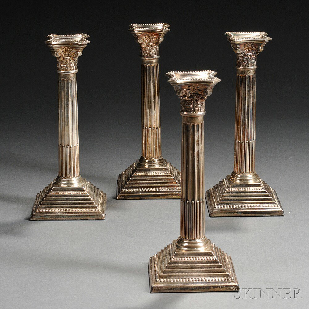 Appraisal: Four Elizabeth II Sterling Silver Candlesticks London - A Taite