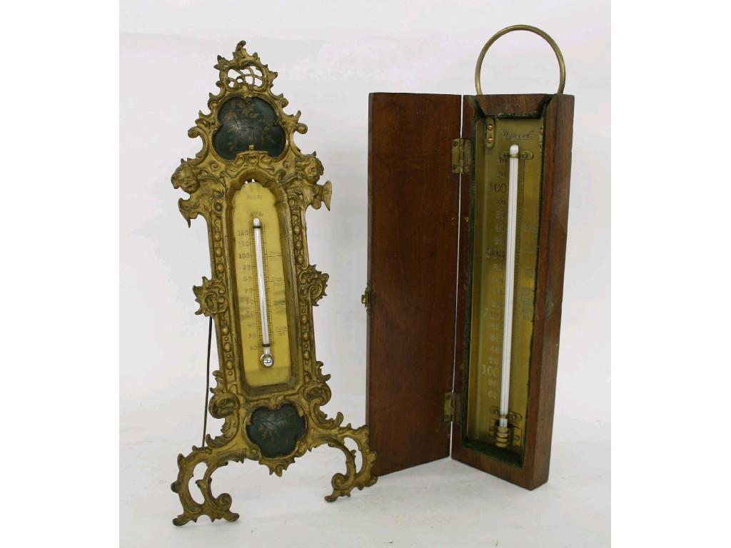 Appraisal: Mahogany cased 'Unecol' brass thermometer high together with another thermometer