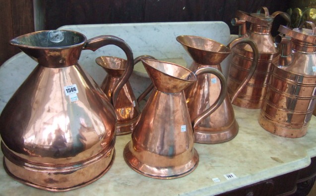 Appraisal: A matched set of four copper 'haystack' measures late th