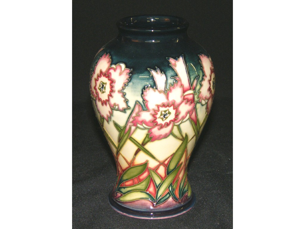 Appraisal: Modern Moorcroft ovoid vase tube line decorated with flowers and