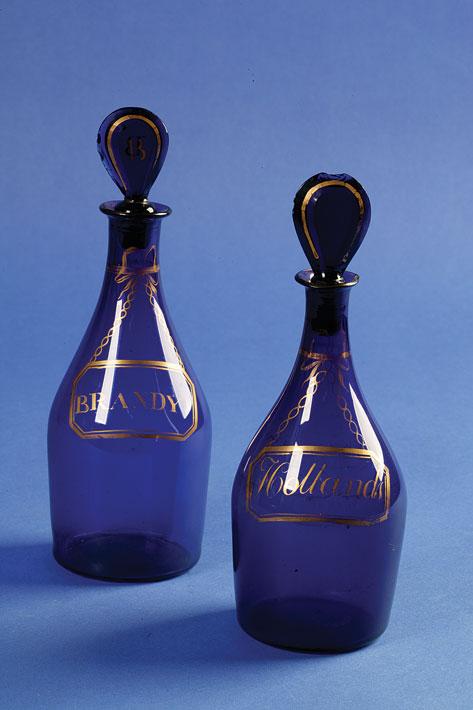 Appraisal: A PAIR OF GEORGE III BRISTOL BLUE MALLET SHAPED DECANTERS