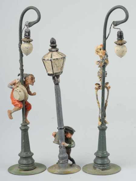 Appraisal: Lot of Halloween Lamp Post Figures Description Includes a cast