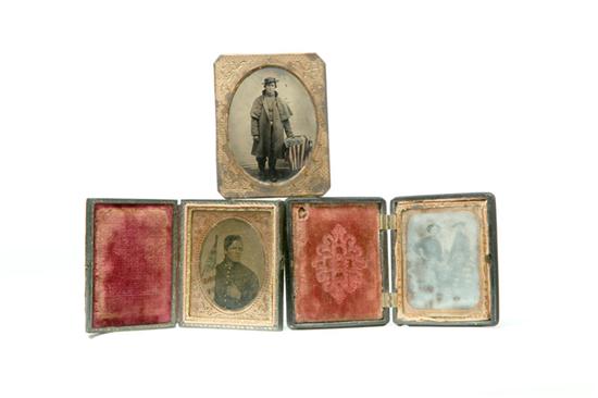 Appraisal: THREE TINTYPES OF MEN IN UNIFORM WITH FLAGS American late