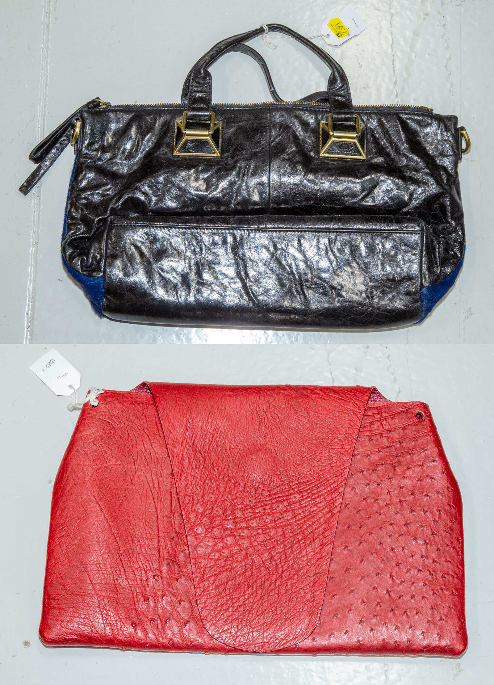 Appraisal: A CROCODILE CLUTCH TREESJE HANDBAG A red crocodile skin red