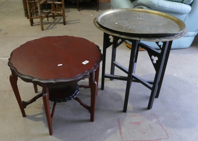 Appraisal: Edwardian walnut shaped side table retractable table with large brass