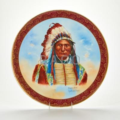 Appraisal: LIMOGES Porcelain charger Painted portrait of Broken Arm Chief of