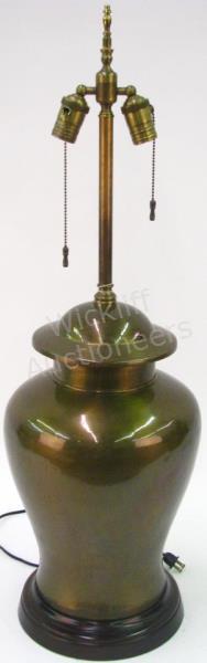 Appraisal: A brass finished metal urn motif table lamp double-bulb fixture