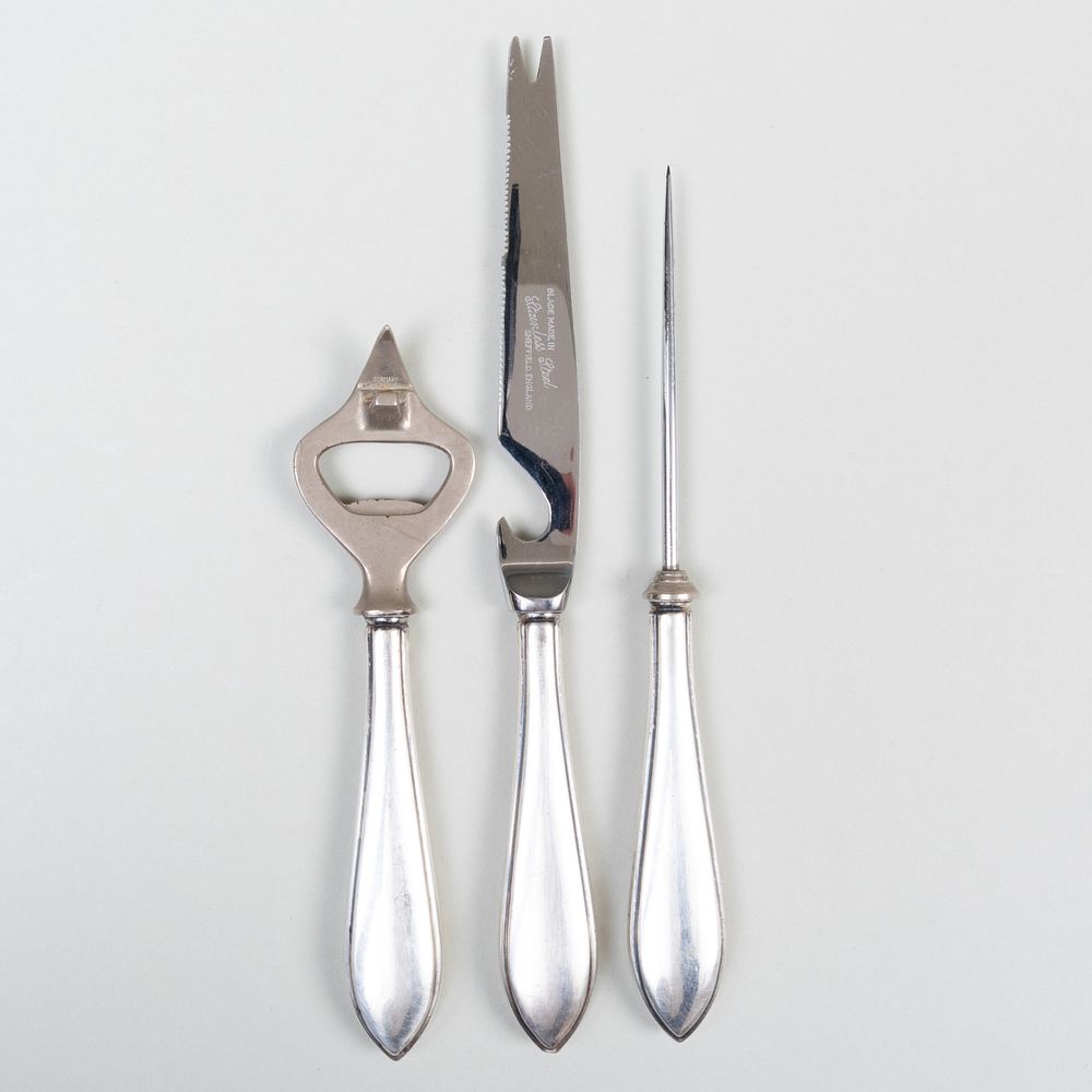 Appraisal: Three Cartier Silver Bar Utensils Marked 'Sterling' Comprising A citrus