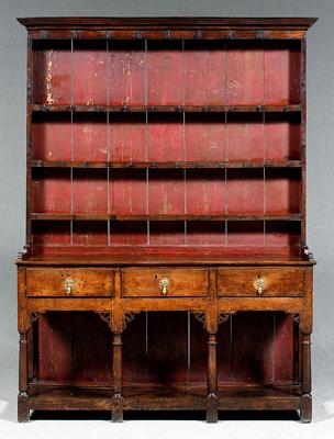 Appraisal: Red-painted oak Welsh dresser and rack with pot board base