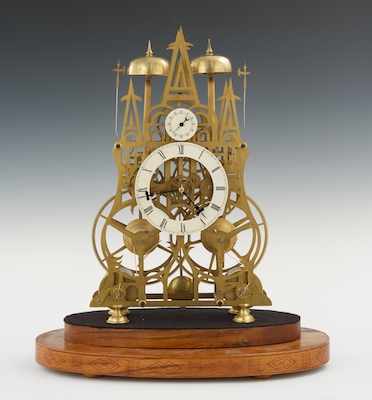 Appraisal: A Large Skeleton Clock th Century Brass cathedral base with