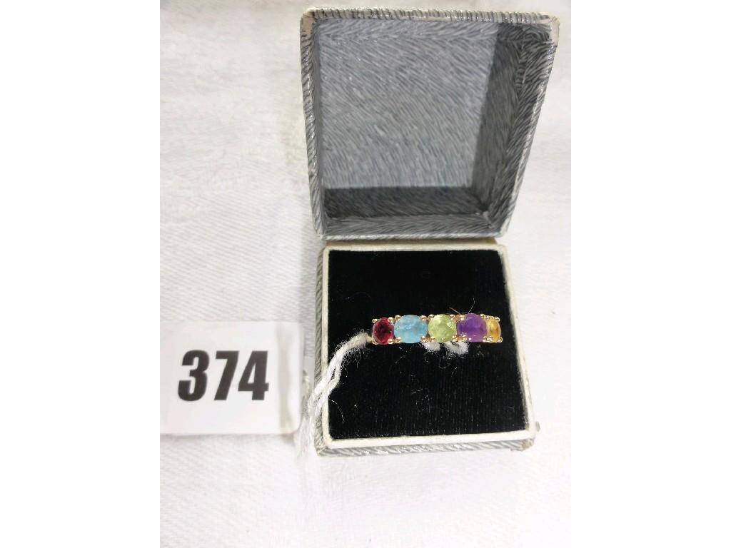 Appraisal: An ct gold ladies ring with coloured stone setting