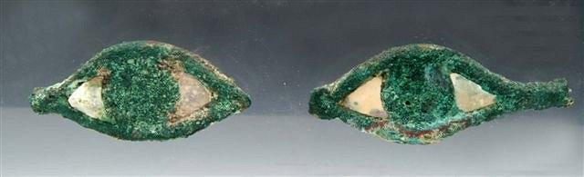 Appraisal: A PAIR OF EGYPTIAN BRONZE AND INLAID FUNERARY EYES with