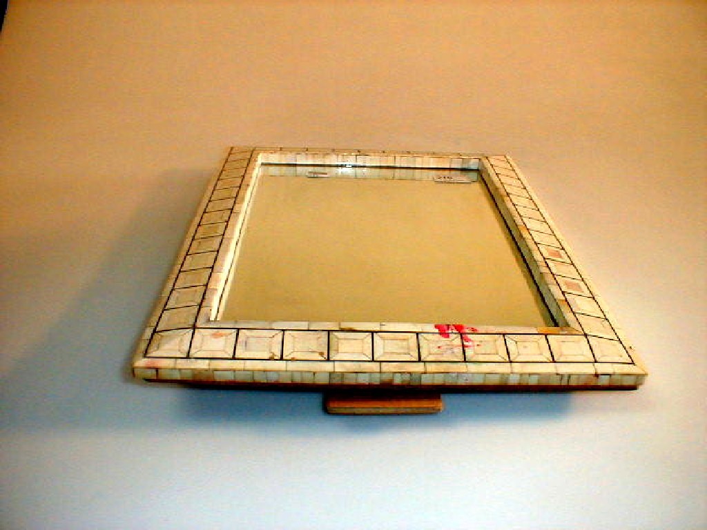 Appraisal: An easel mirror the rectangular glass within an ivory and