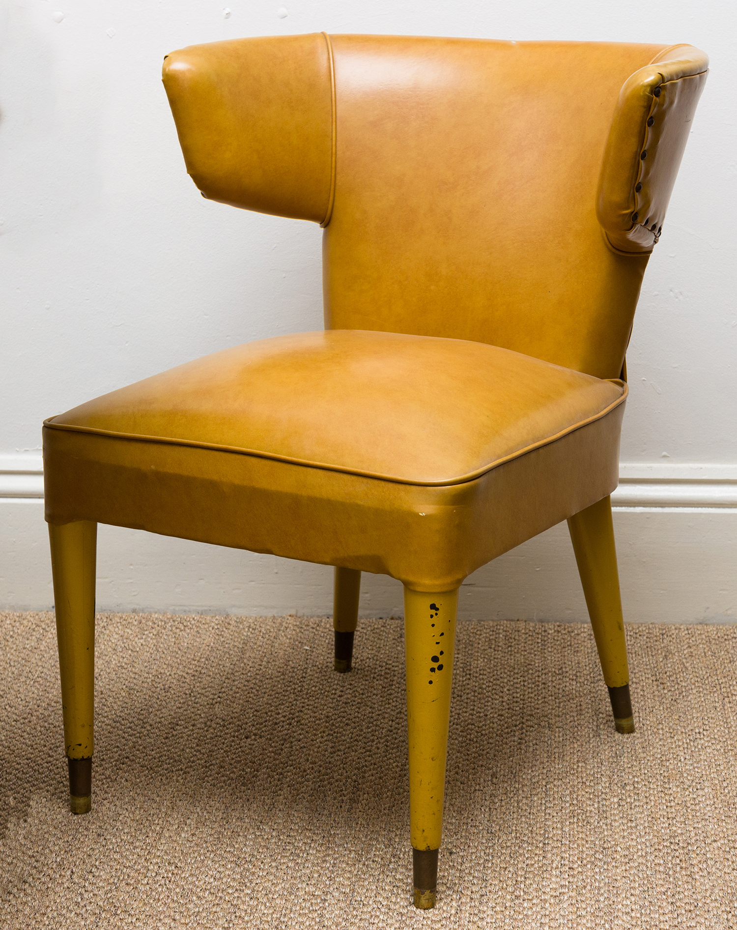 Appraisal: A SET OF FOUR MID-CENTURY WING BACKED DINING CHAIRS IN