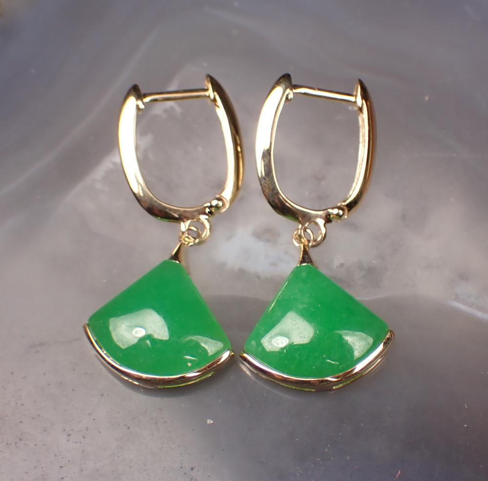 Appraisal: PAIR OF JADE AND FOURTEEN KARAT GOLD EARRINGS each yellow