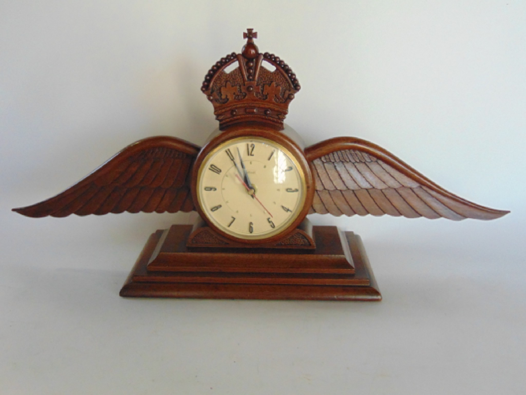 Appraisal: An early th century carved walnut mantel clock case in