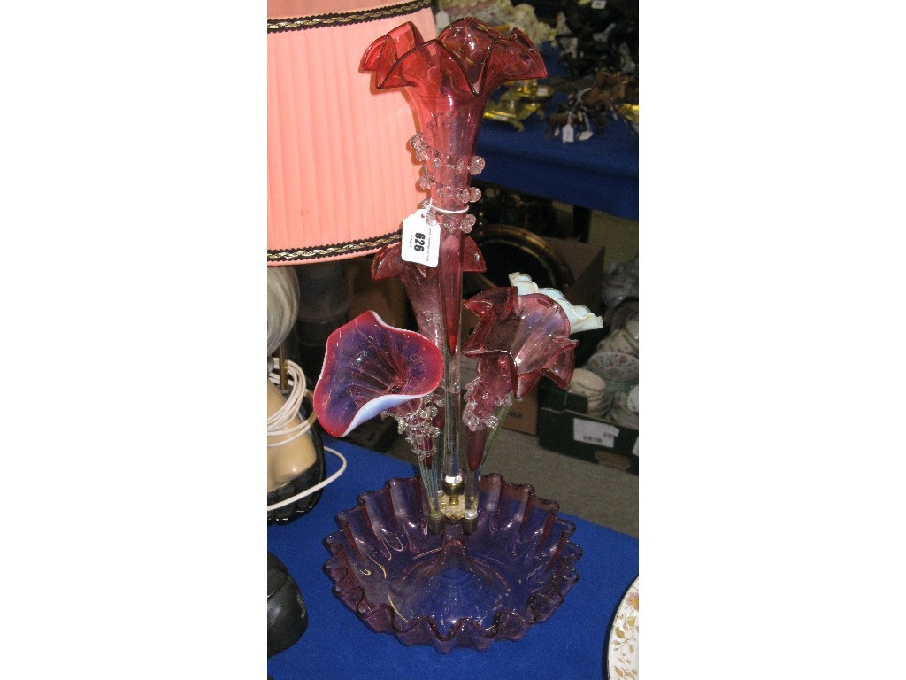 Appraisal: Cranberry glass epergne with two unassociated glass flutes