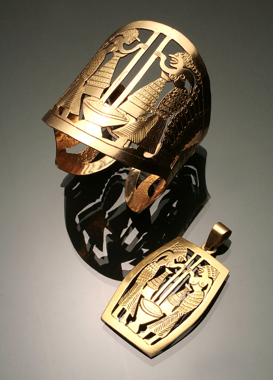 Appraisal: -Karat Yellow-Gold Two-Piece Ensemble Consisting of a reticulated figural cuff