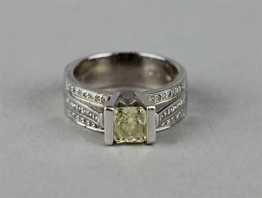 Appraisal: LADY'S MODERN FANCY YELLOW PRINCESS CUT AND WHITE DIAMOND RING