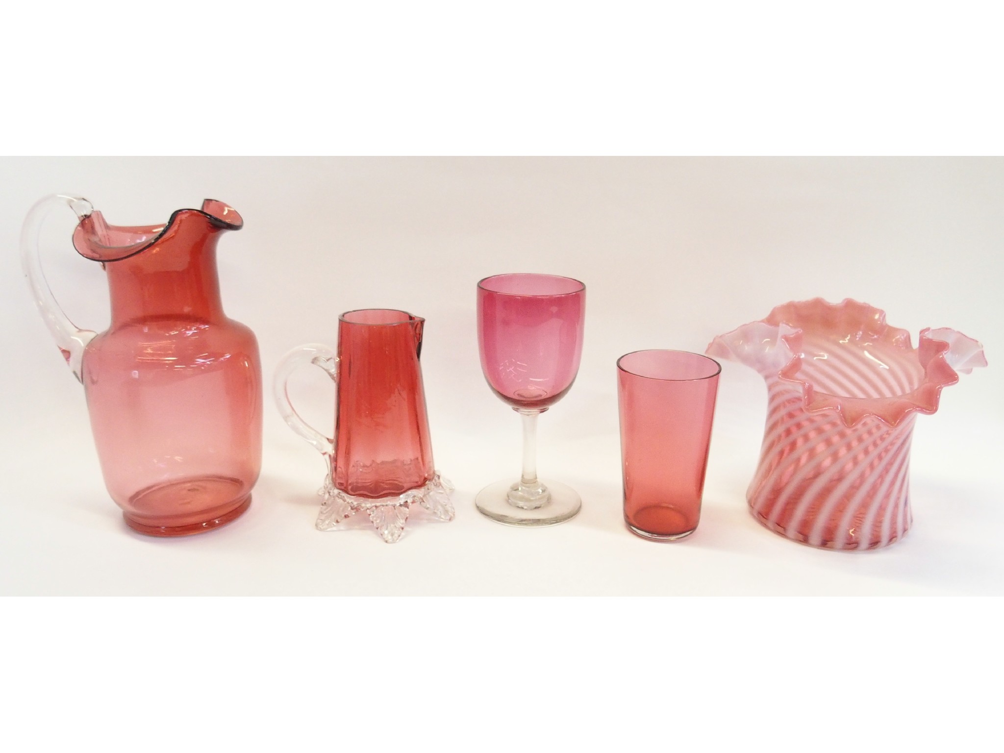 Appraisal: Cranberry glass jug wine stem cup and small jug with