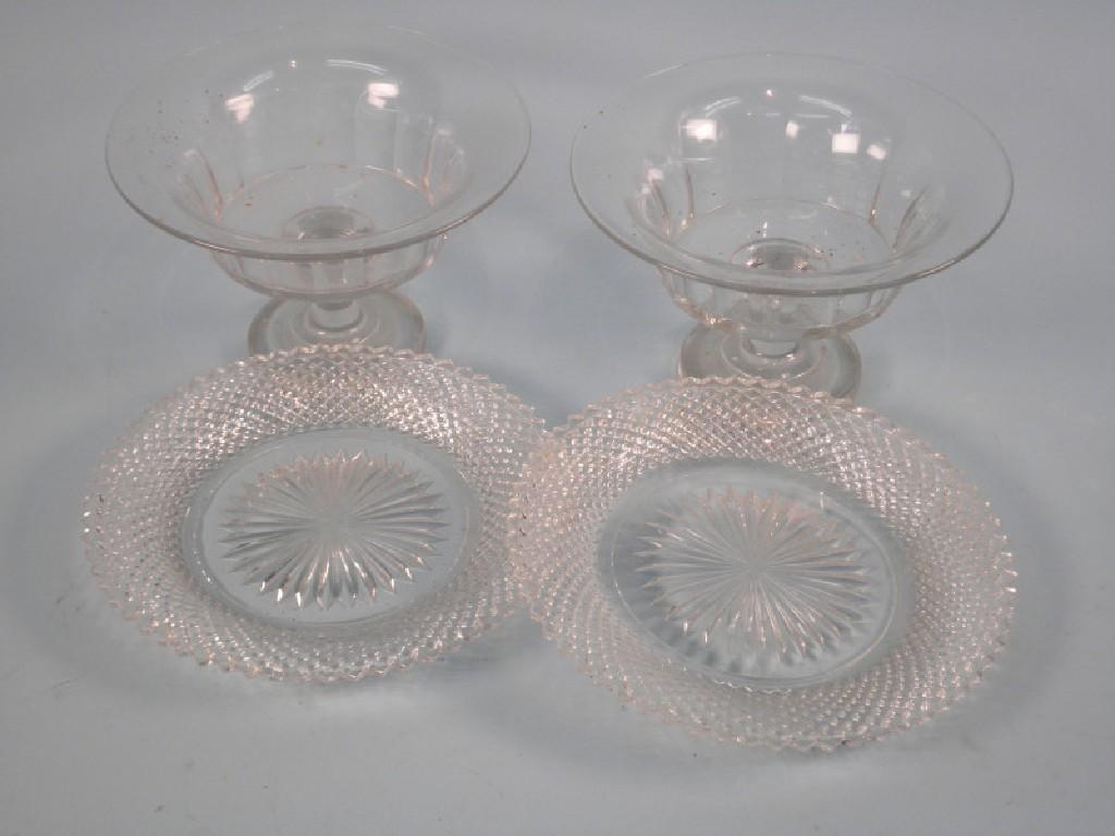 Appraisal: A pair of thC cut glass bowls each on a