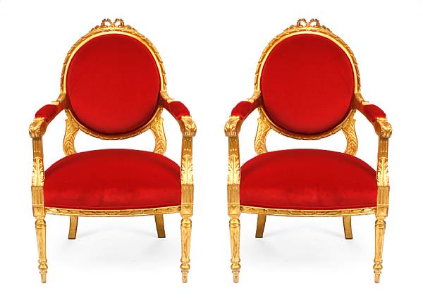 Appraisal: A pair of Louis XVI style giltwood fauteuils height in