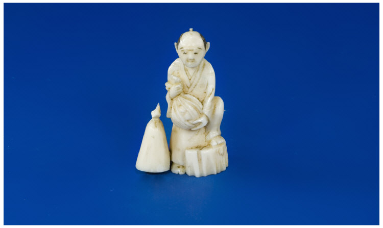 Appraisal: Early th Century Miniature Ivory Figure Japanese Man Carrying a