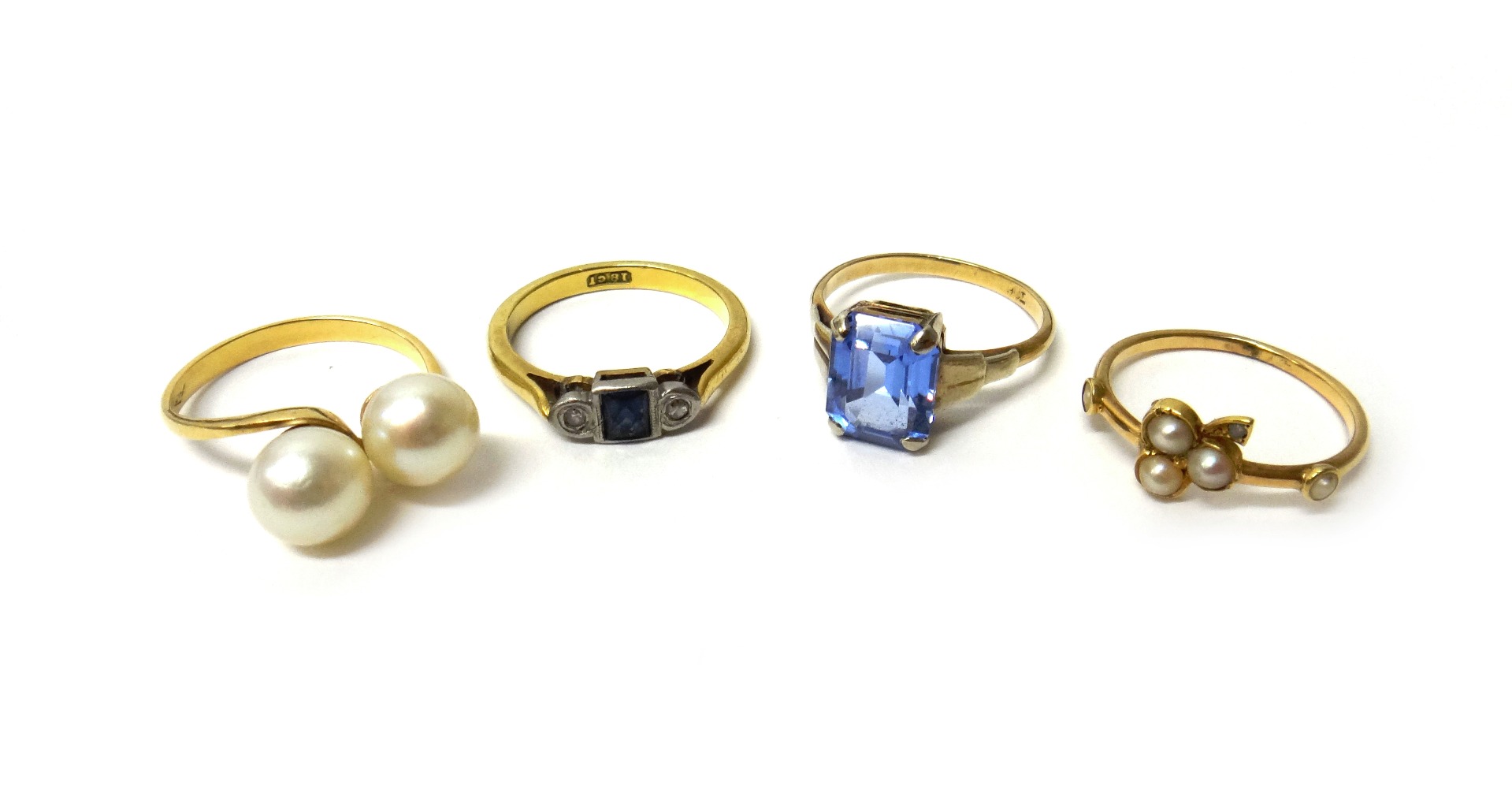 Appraisal: A gold sapphire and diamond set three stone ring detailed