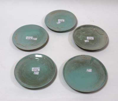 Appraisal: Sibley Pottery five plates with celadon glaze incised stylised waves