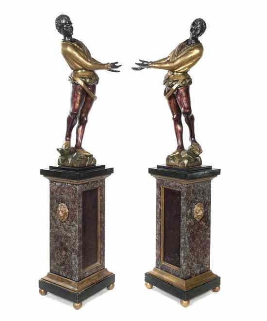 Appraisal: A Pair of Venetian Carved Gilt and Polychrome Decorated Blackamoors