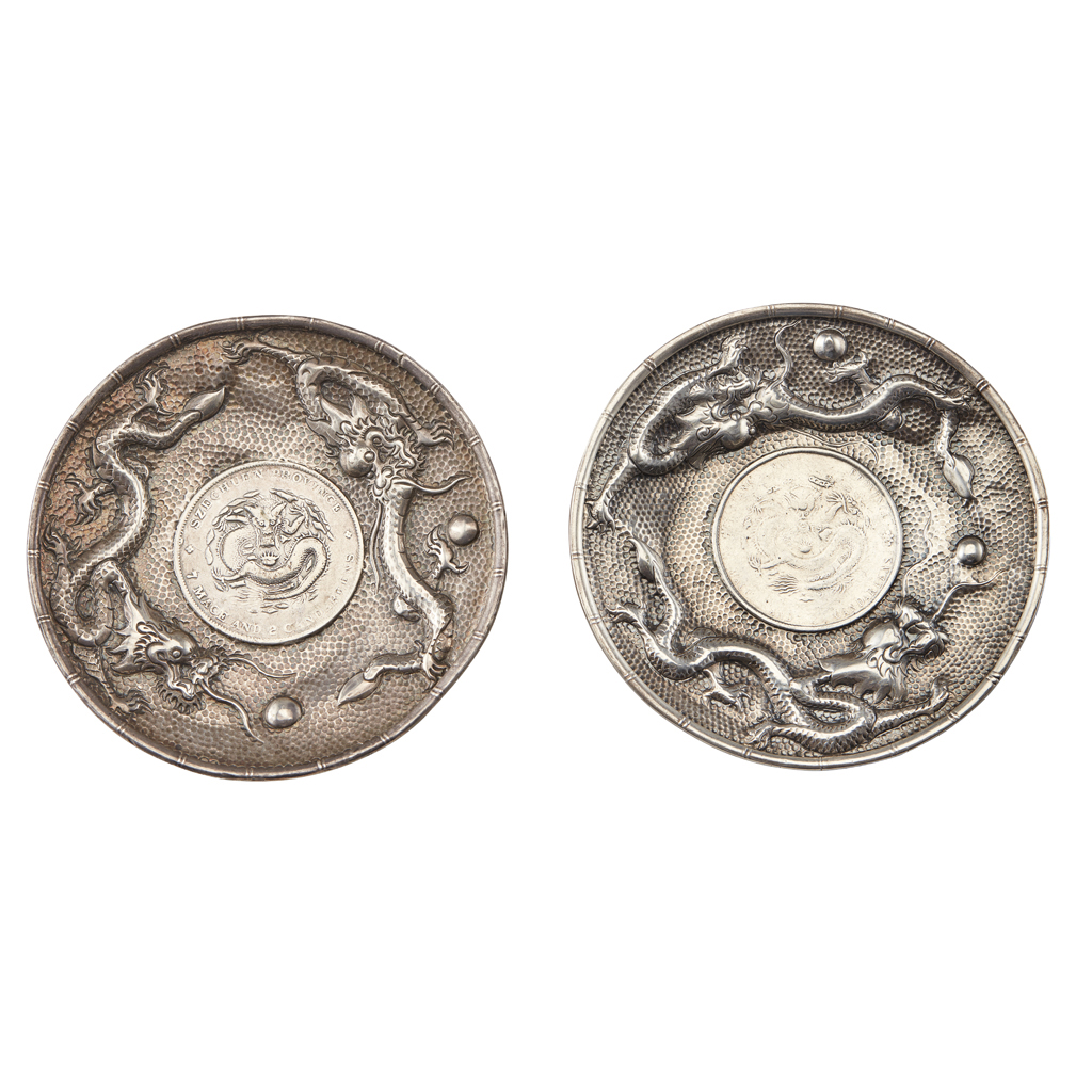 Appraisal: PAIR OF DISHES INSET WITH SILVER COINS REPUBLIC PERIOD each