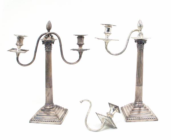 Appraisal: A pair of Sheffield plate columnar candlesticks with two light