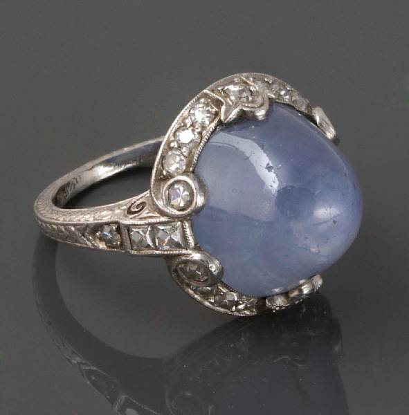 Appraisal: An art deco star sapphire diamond and platinum ring ring