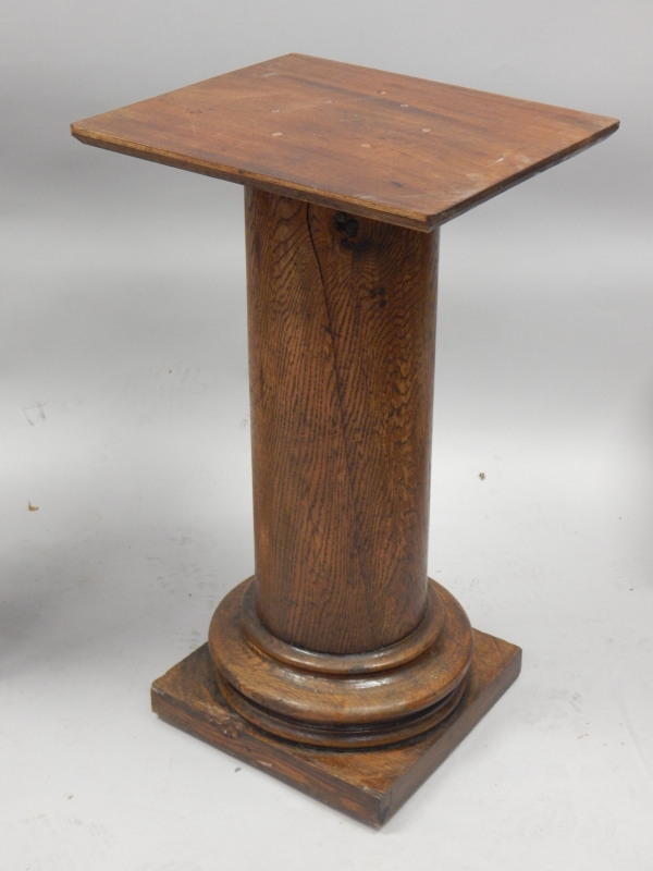 Appraisal: A mahogany and oak pedestal of turned form the rectangular