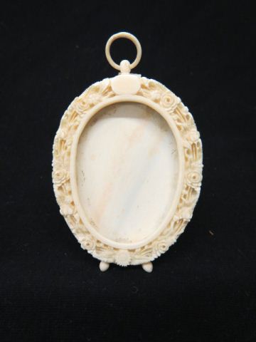 Appraisal: Carved Ivory Picture Frame 's elaborate floral overall x